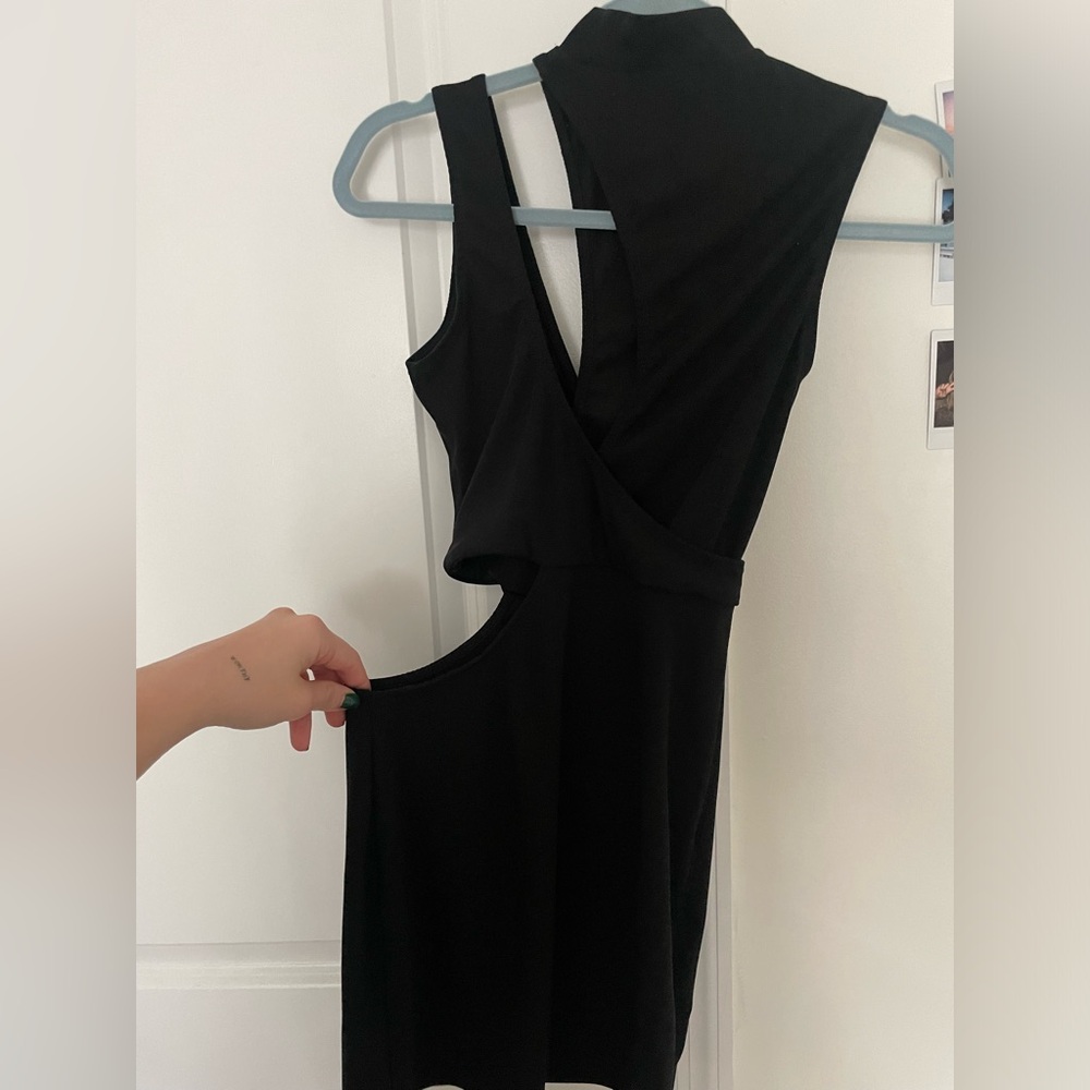 Adika black mini dress cutout.